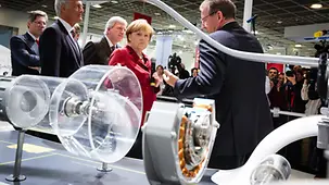 Chancellor Angela Merkel at the stand of the automotive supplier Schaeffler.