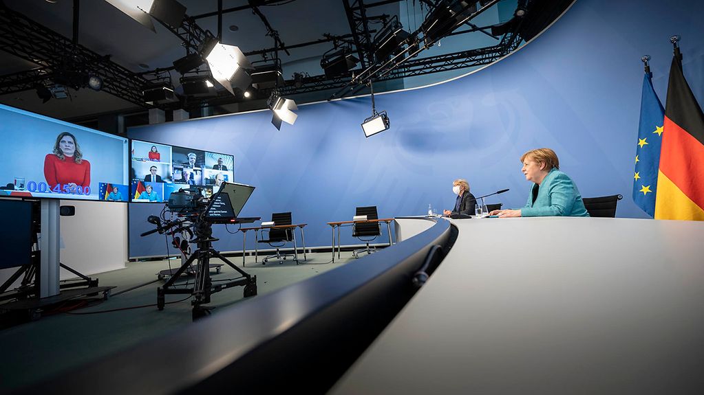 Chancellor Angela Merkel attends the research summit by video link from the Federal Chancellery.