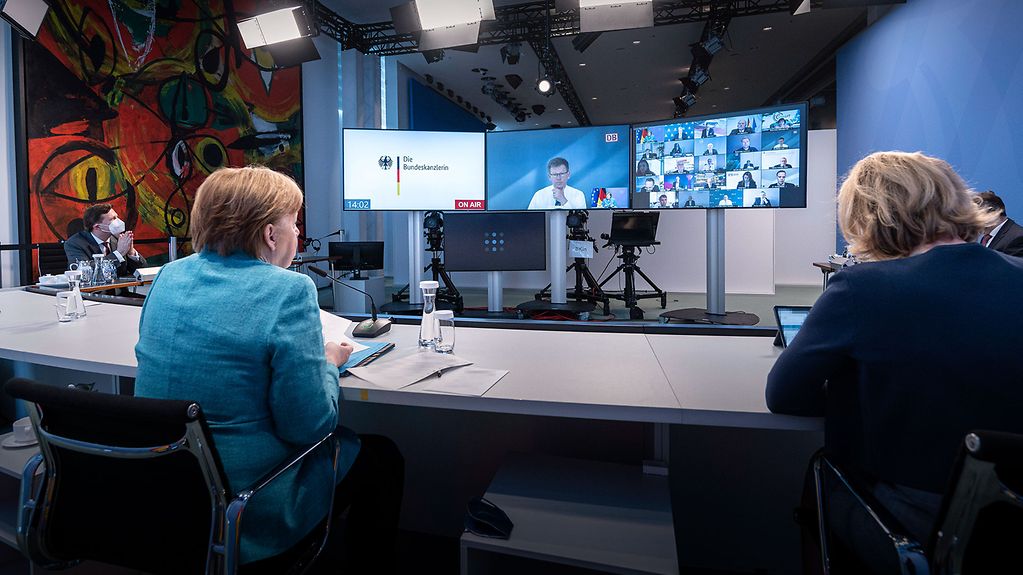 Chancellor Angela Merkel in discussion with representatives of the business community during a video conference on the digital identities ecosystem
