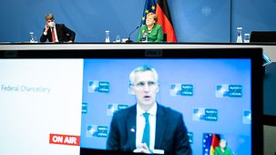 Chancellor Angela Merkel in discussion with NATO Secretary General Jens Stoltenberg