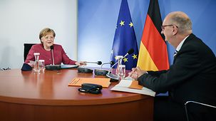 Chancellor Angela Merkel with Dietmar Woidke, Brandenburg's Minister President, during her meeting with the Heads of Government of the Eastern Länder