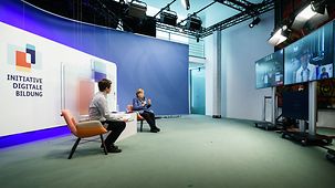 Federal Chancellor Angela Merkel via video conference at the IT education centre TUMO.