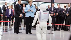 Chancellor Angela Merkel visits the National Museum of Emerging Science and Innovation.