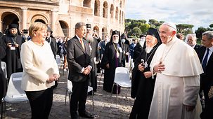 Federal Chancellor Angela Merkel with her husband, Joachim Sauer, and Pope Francis outside the Colosseum.