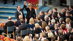 Merkel und Hollande während der Verleihung des Friedensnobelpreises an die EU.