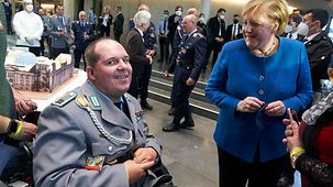 Federal Chancellor Angela Merkel talks to Sven Hornig.