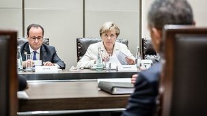 Bundeskanzlerin Angela Merkel beim G20-Gipfel im Gespräch mit Frankreichs Präsident François Hollande und US-Präsident Barack Obama.