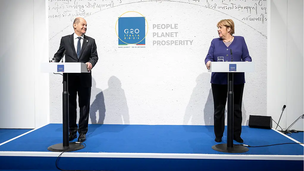 Bundeskanzlerin Merkel und Bundesfinanzminister Scholz bei der gemeinsamen Pressekonferenz in Rom.