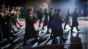 Federal Chancellor Olaf Scholz with Mateusz Morawiecki, the Polish Prime Minister, receiving military honours.