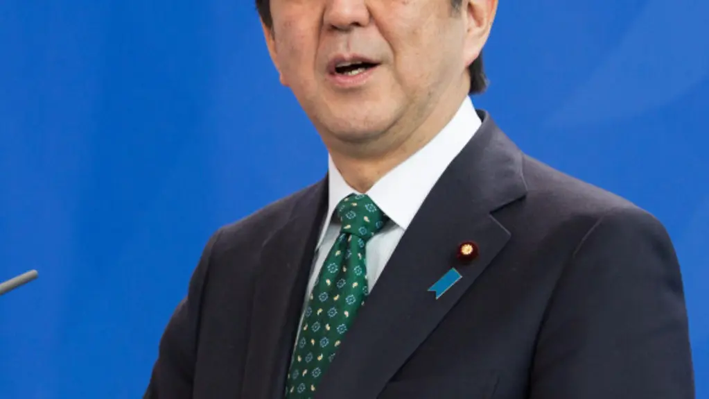 Shinzo Abe, Prime Minister of Japan, during a press conference in the Federal Chancellery