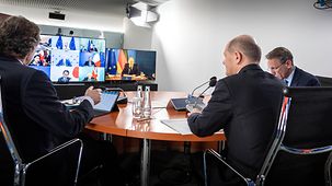 Federal Chancellor Olaf Scholz during a video conference with EU leaders and French President Emmanuel Macron.