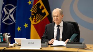 Federal Chancellor Olaf Scholz at a NATO video conference.