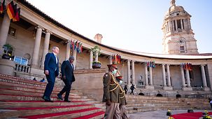 Bundeskanzler Olaf Scholz mit Cyril Ramaphosa, Südafrikas Präsident.