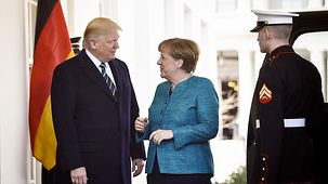 President Donald Trump welcomes Chancellor Angela Merkel at the White House.