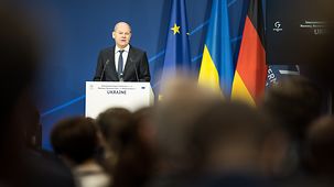 Federal Chancellor Olaf Scholz speaking at the International Expert Conference on the Recovery, Reconstruction and Modernisation of Ukraine