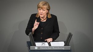 Merkel am Rednerpult.