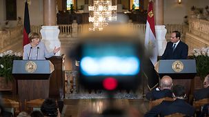 Chancellor Angela Merkel and Egypt's President Abdel Fattah Al-Sisi at a joint press conference