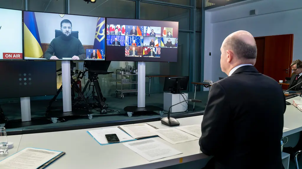 Federal Chancellor Olaf Scholz taking part in a video call with the G7 and the Ukrainian President.
