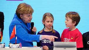 Chancellor Angela Merkel at the Microsoft stand