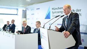 Federal Chancellor Olaf Scholz meeting with German business leaders at the Munich Trade Fair Centre.