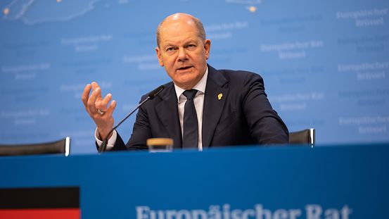 Federal Chancellor Olaf Scholz holding a press conference in Brussels.