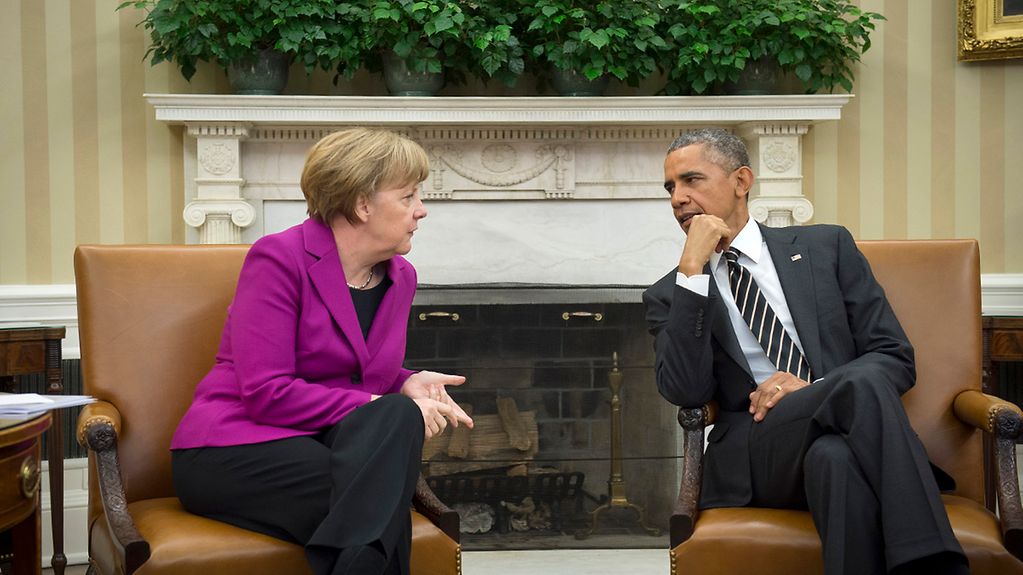 Chancellor Angela Merkel talks with President Barack Obama.