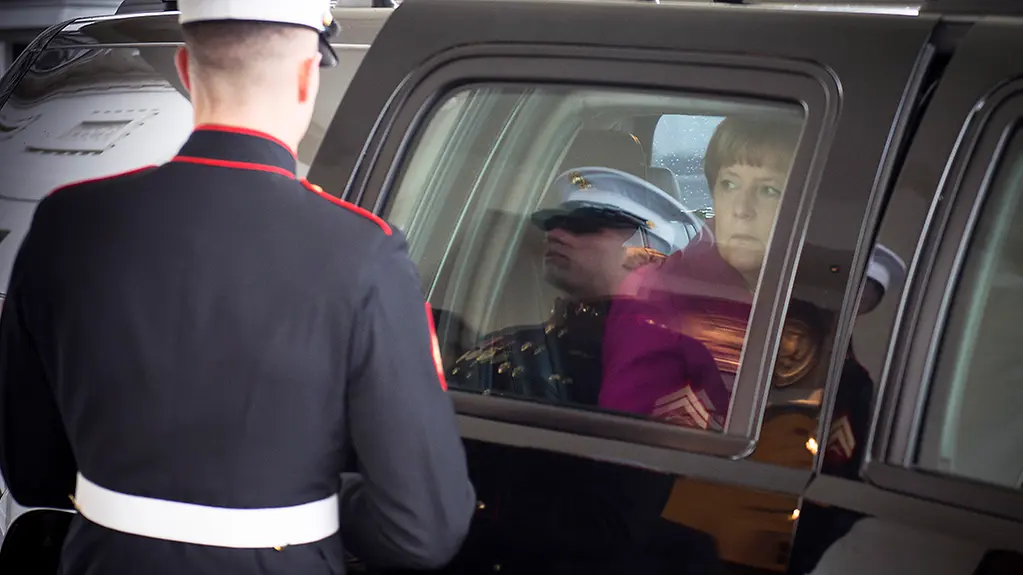 Chancellor Angela Merkel arrives by car.