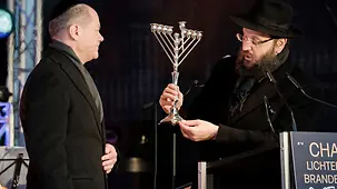 Federal Chancellor Olaf Scholz during the lighting of the Hanukkah candles at the Brandenburg Gate.