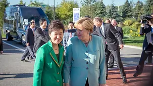 Angela Merkel greets Park Geun-hye.