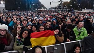 Visitors with a German flag
