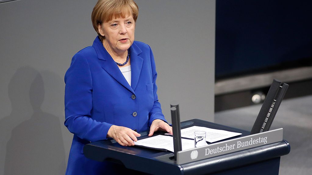 Chancellor Angela Merkel delivers a government statement in the German Bundestag.