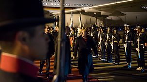 Federal Chancellor Angela Merkel is welcomed at the airport in Buenos Aires.
