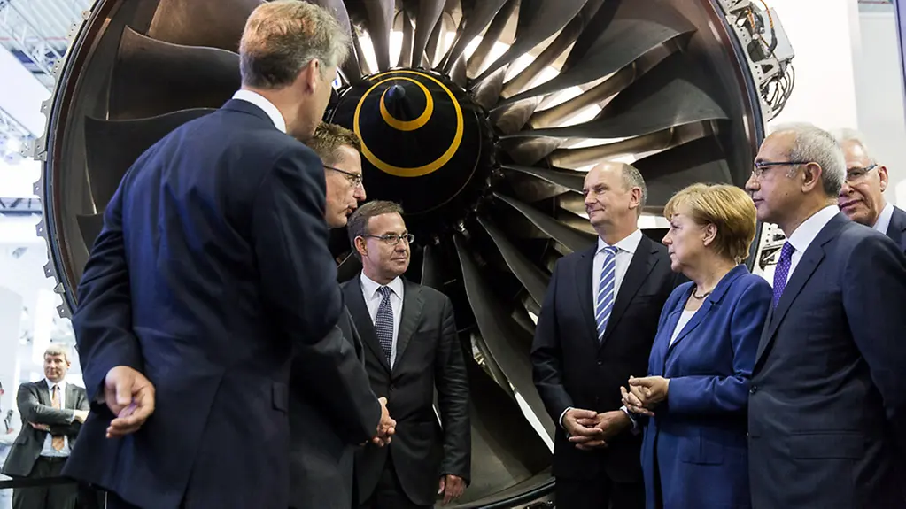 La chancelière fédérale Angela Merkel lors de sa visite du site de l'ILA