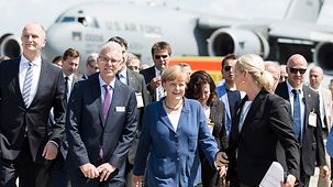 Chancellor Angela Merkel tours the ILA Berlin Air Show.