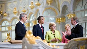Bundeskanzlerin Angela Merkel und US-Präsident Barack Obama besuchen die Frauenkirche in Dresden.