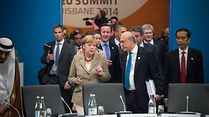Lors de l'ouverture du sommet du G20, Angela Merkel s'entretient avec le secrétaire général de l'OCDE, José Ángel Gurría Treviño