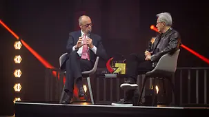 Bundeskanzler Friedrich Merz im Gespräch mit Jensen Huang, Geschäftsführer von Nvidia, beim Auftakt zum Investitionsgipfel.