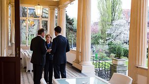Chancellor Angela Merkel in discussion with Dutch Prime Minister Mark Rutte a the state premier of Lower Saxony Stephan Weil