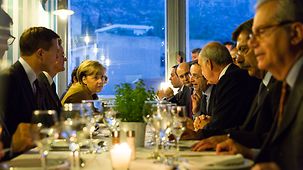 Chancellor Angela Merkel and Greek Prime Minister Antonis Samaras enjoy dinner.