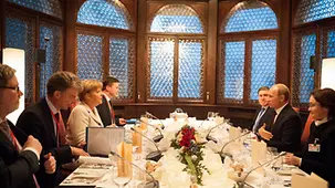 Angela Merkel and Vladimir Putin at dinner