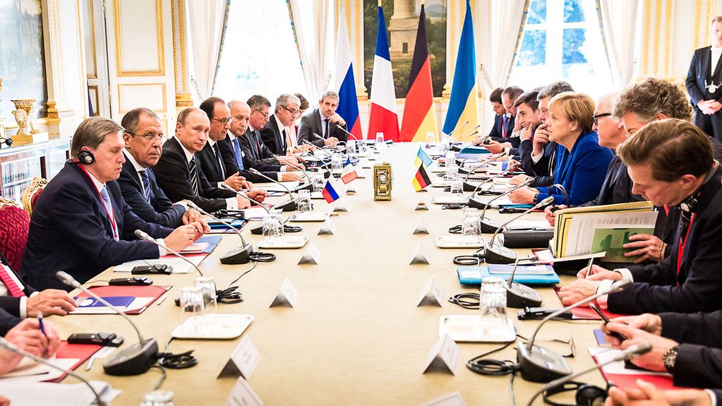 La chancelière fédérale Angela Merkel s'entretient avec les présidents français, russe et ukrainien