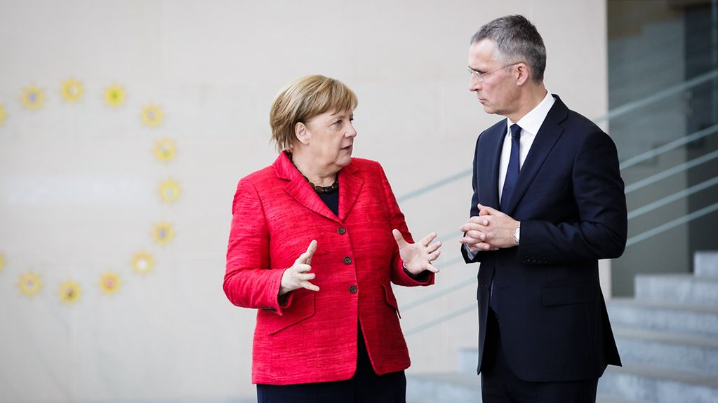 Chancellor Angela Merkel in discussion with NATO Secretary General Jens Stoltenberg in the Cabinet Room of the Federal Chancellery