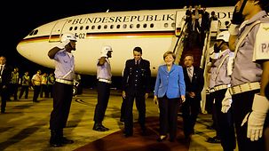 Federal Chancellor Angela Merkel arrives at the airport if the capital Brasília