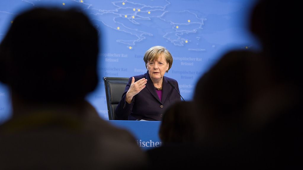 Chancellor Angela Merkel at the press conference on the first day of the summit