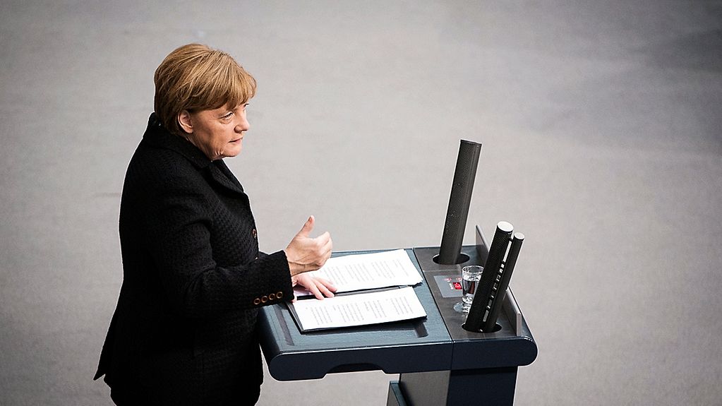 Chancellor Angela Merkel delivers a government statement on this week's European Council meeting in the German Bundestag.