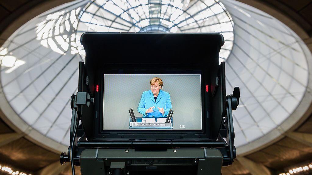 Chancellor Angela Merkel speaks in the German Bundestag during the debate on the 2016 budget
