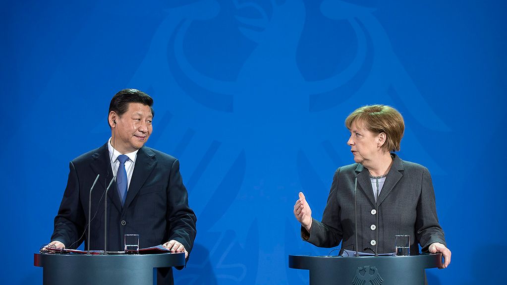 Chancellor Angela Merkel and Chinese President Xi Jinping give a statement to the press.