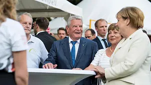 Chancellor Angela Merkel with Federal President Joachim Gauck and Daniela Schadt at the party hosted by the Federal President for engaged citizens