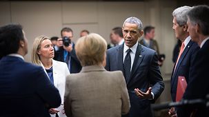 La chancelière fédérale Angela Merkel en conversation avec le président américain Barack Obama