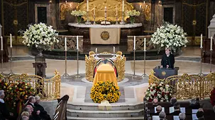 Chancellor Angela Merkel speaks at the state funeral for Helmut Schmidt in Hamburg's St. Michael's Church.